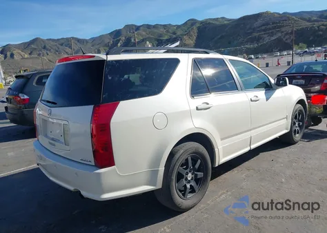 2009 Cadillac Srx V6 z USA, uszkodzony, nr VIN 1GYEE637390113015